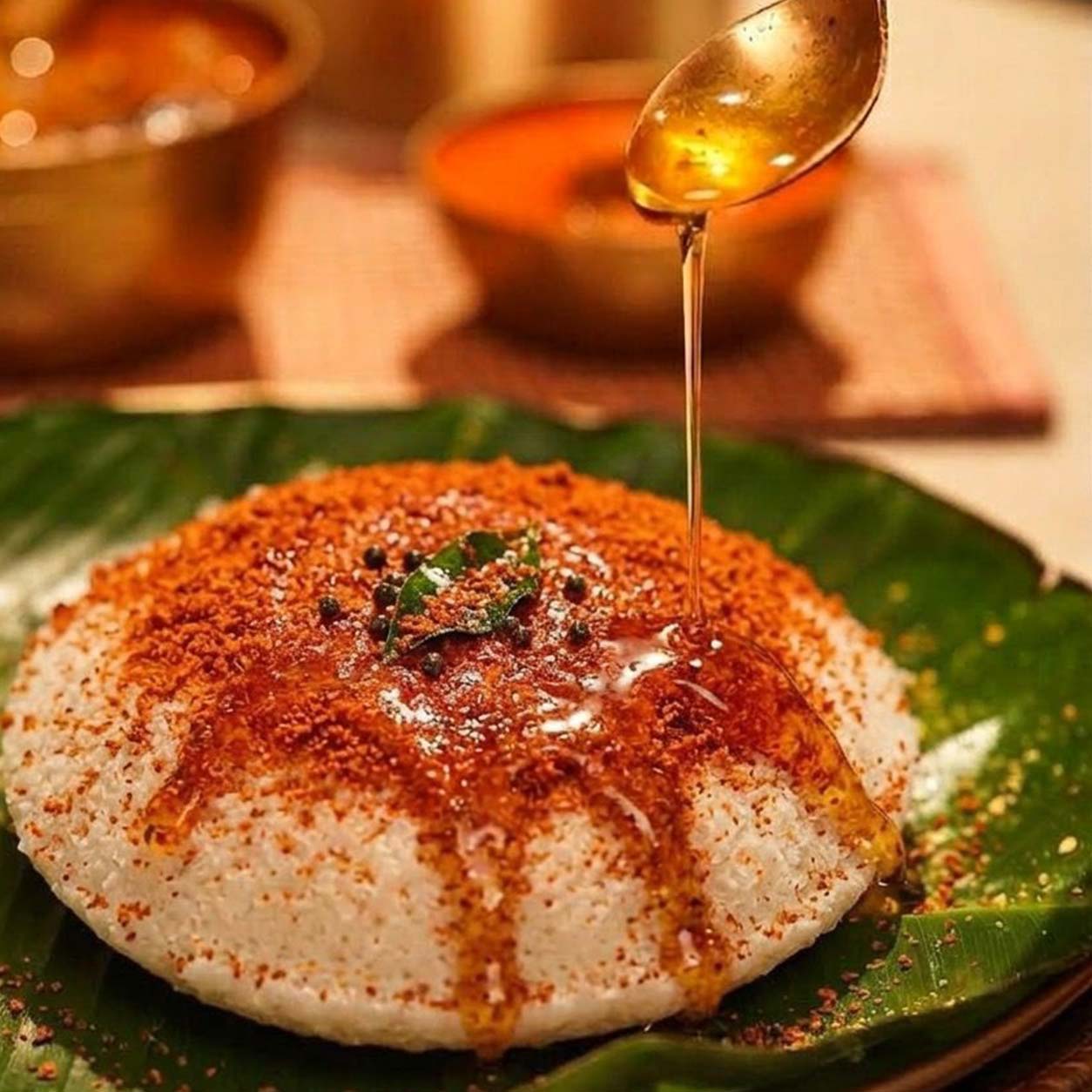 Soft idli served with sambar and coconut chutney - authentic South Indian breakfast